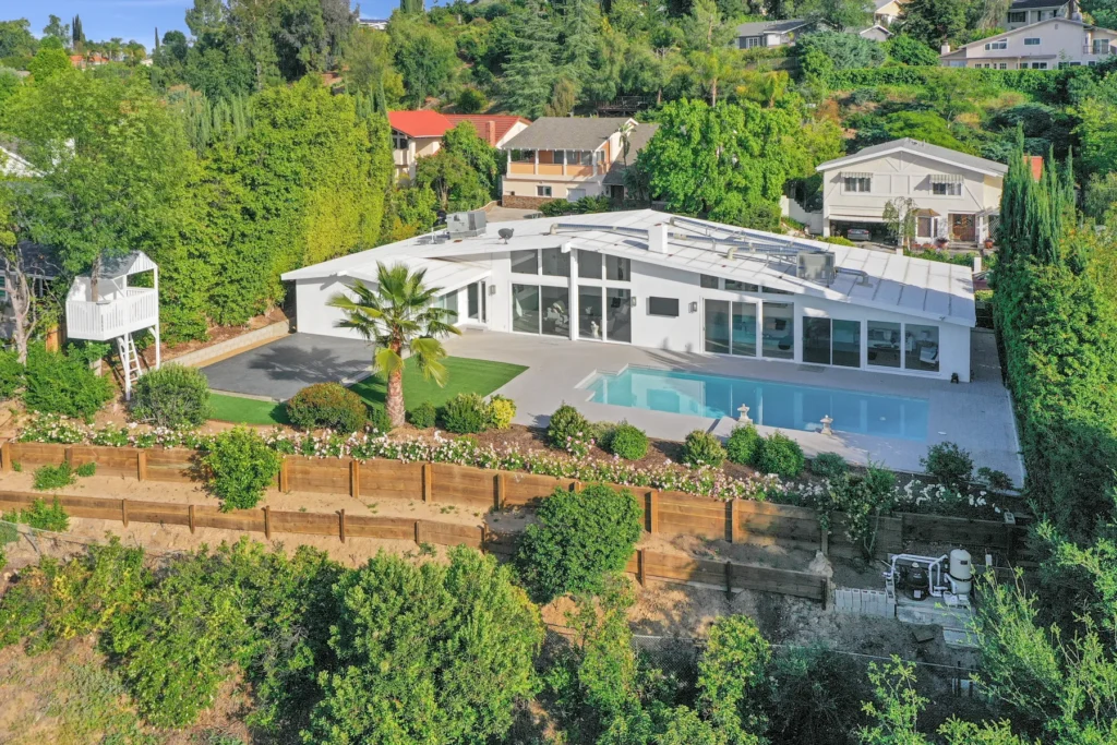 Aerial drone photo of residential home and neighborhood